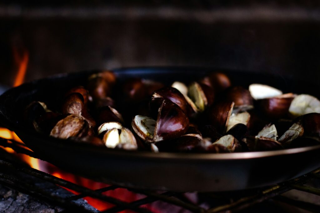 Chestnuts Roasting on an Open Fire covering Christmas traditions, song origins, roasted chestnuts, holiday recipes, and festive history.