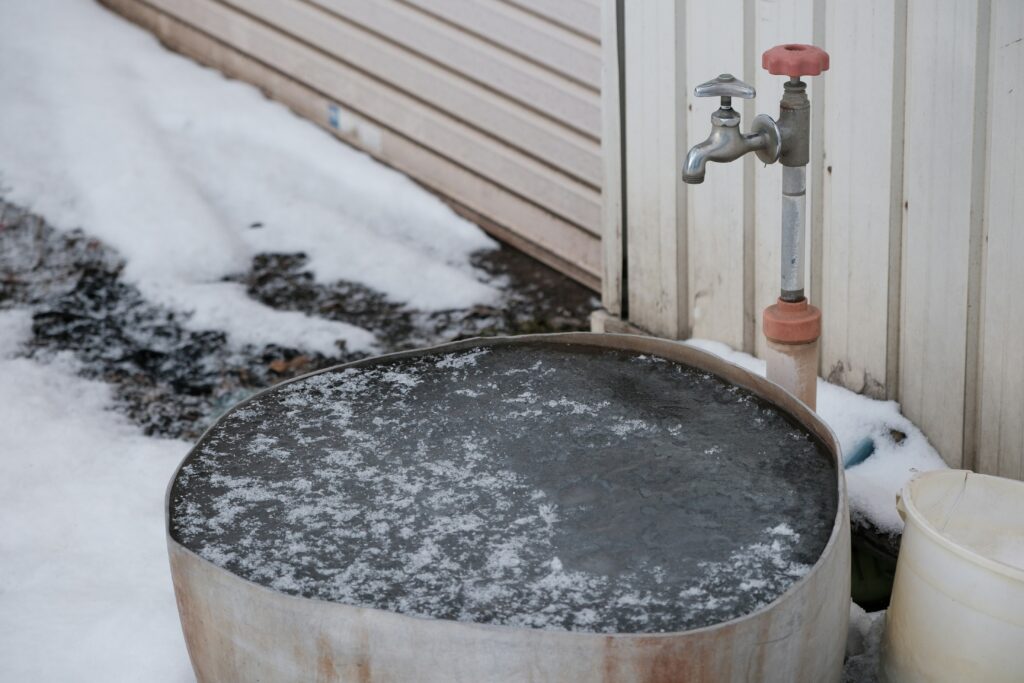 If Heated Water Is Used to Sanitize It Must Be at 171°F or Higher: Commercial kitchen worker using hot water to sanitize food-contact surfaces safely.