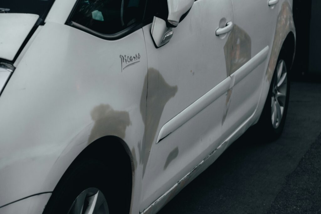 How to Get a Dent Out of a Car covering dent pullers, suction cups, heat techniques, body panels, paint protection, and DIY repairs.